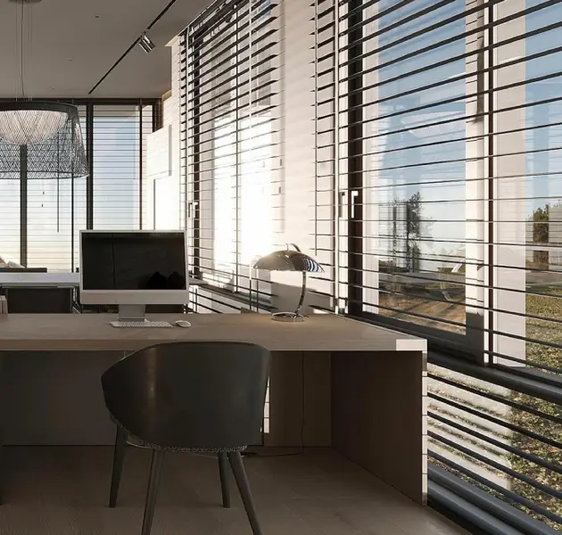 Close-up view of sleek roller blinds in Dubai office