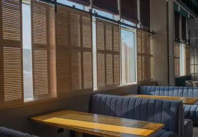 Solar shades minimizing glare in Dubai office